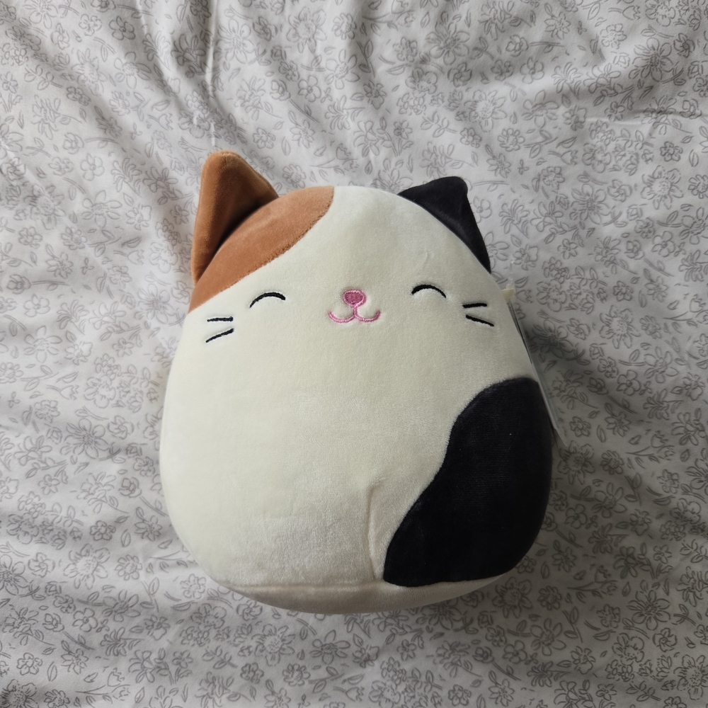 Cam Squishmallow  - Cream, Black, and Brown